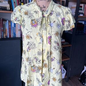 ModCloth "Home on the Prairie" yellow astrology zodiac print shirt